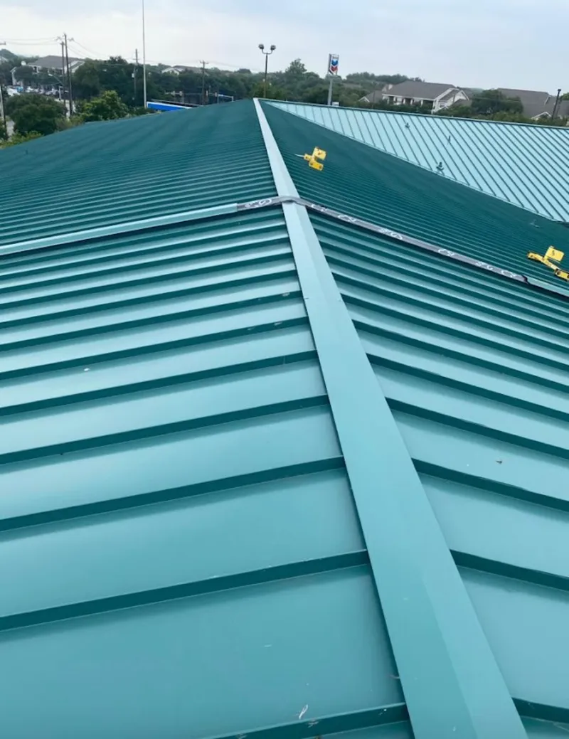 Green commercial metal roof ridge and valley for Metal Roof Repair in Lorain
