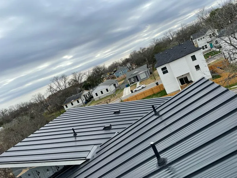 Standing seam metal roof panels with vents for Skylight Repair in Lorain